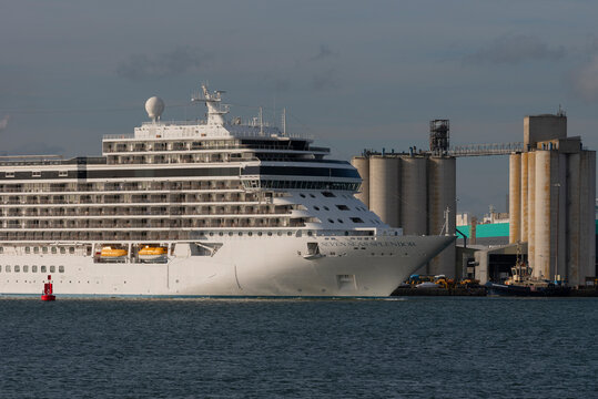Southampton, England,UK. 2022.  Cruise liner passing silos as the Seven Seas Splendor luxury liner makes her way out of port.