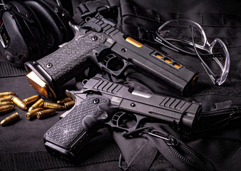 Pair of sport pistols - obrazy, fototapety, plakaty