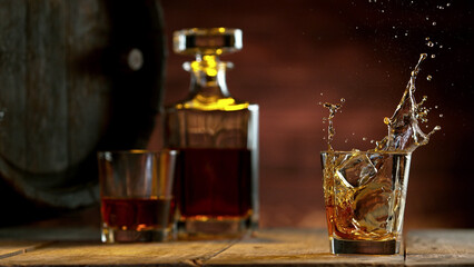 Freeze motion of splashing whisky.