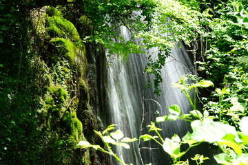 Secret Menotre Waterfall view between the trees, Pale, Foligno, Umbria, Italy