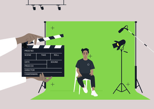 A chroma key screen in a movie studio, A young male Caucasian character sitting on a chair, a confident handsome actor being filmed in a video