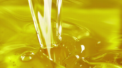 Pouring cooking oil, closeup