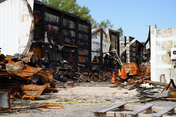 Fototapeta premium Burned building from a chemical fire out in the countryside.
