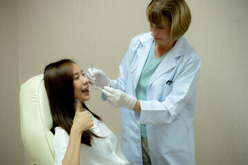 Dentist examining patient's teeth.Healthcare and medicine concept.