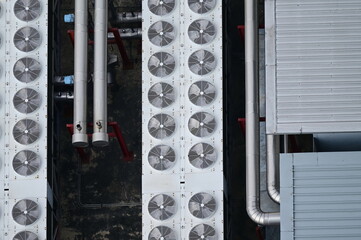 Top view of Impellers for large air conditioners lined up on tall buildings. Industrial air cooling...