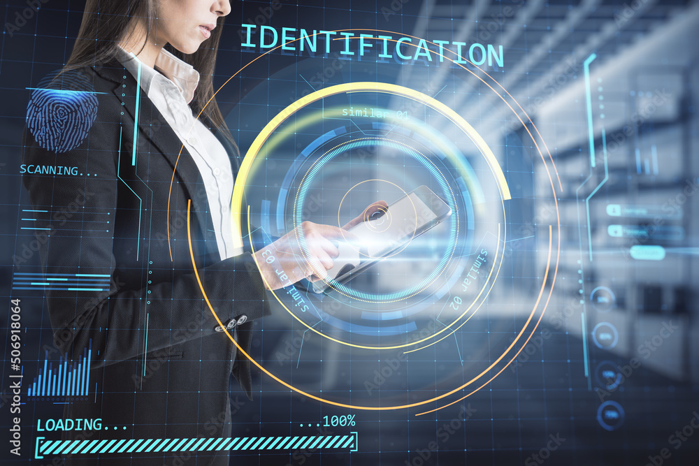 Aufkleber Cybernetics on the internet and big data business concept with digital screen with identification process and young woman using digital tablet