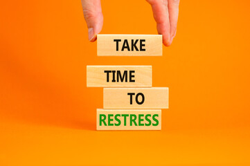 Take time to restress symbol. Concept words Take time to restress on wooden blocks. Beautiful orange table orange background. Psychological business and take time to restress concept. Copy space.