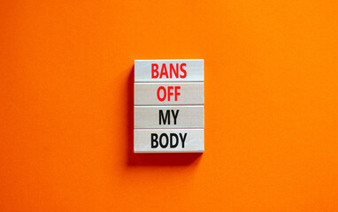 Bans off my body symbol. Concept words Bans off my body on wooden blocks on a beautiful orange...