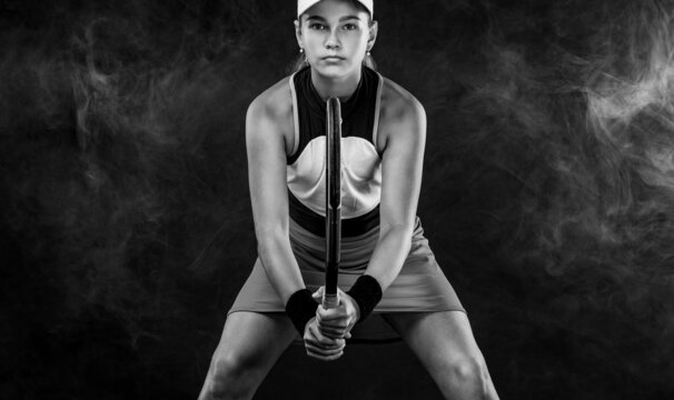 Tennis player. Beautiful girl teenager and athlete with racket in pink sporswear and hat on tennis court. Sport concept. Download Tennis Social Media Template