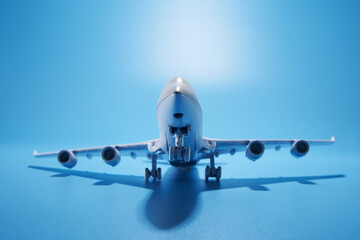 toy airplane against blue background