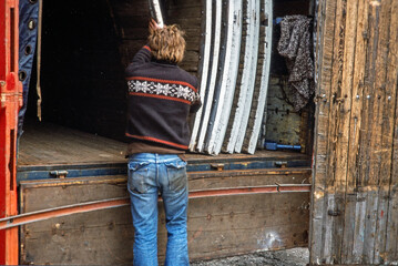 Building up the Wall of death. Fairground. Netherlands.