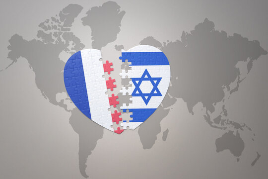 puzzle heart with the national flag of france and israel on a world map background. Concept.