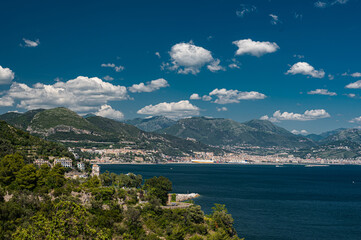 Naklejka na ściany i meble Seascape on the Amalfi Coast, Province of Salerno, Campania. Mountains, sea and blue sky with clouds. Southern Italy.