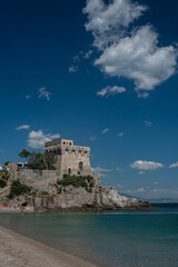 Fototapeta na wymiar Torre La Cerniola. Landscape of the castle in Erce, Salerno province, Campania. Southern Italy. European seaside resorts, summer tourism.