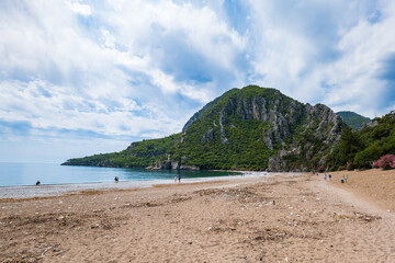  Olympos (Olimpos) and Cirali (Çıralı) beach and mountain view in Kemer, Antalya, Turkey. Olympos and Cirali are popular tourist destinations in Turkey.
