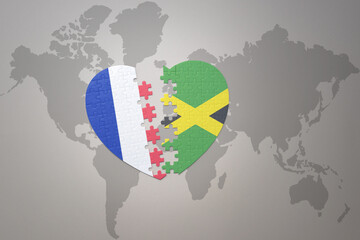 puzzle heart with the national flag of france and jamaica on a world map background. Concept.
