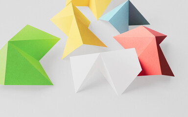 Geometric shapes made paper, white background