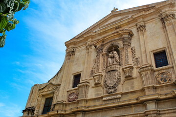 Main facade of the Church of Santo Domingo in Murcia, in baroque style with sculpture	
