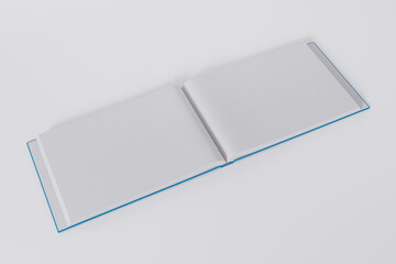 Mockup of a rectangular open book with a blank, glossy, blue cover on white background. Isolated with clipping path.	