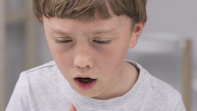 Boy of 9 years old has a strong coughing
