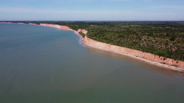 High and extensive cliffs on the coast of Bahia. Amazing nature. drone top view