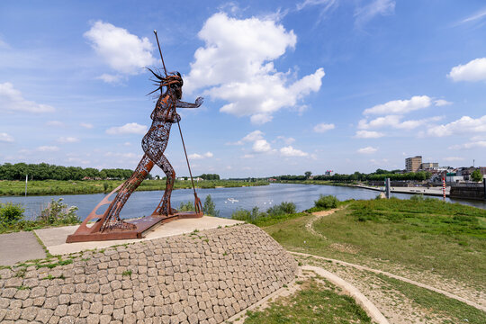 VENLO, THE NETHERLANDS - MAY 22, 2022: nine-meter-high artwork &lsquo;De vreedzame Krijger&rsquo; (the peaceful warrior) at the river Maas.