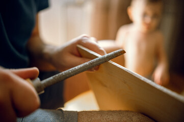 son watches as dad collects furniture