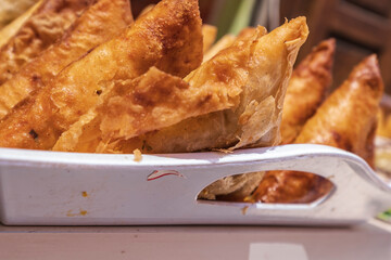 briouats in a street restaurant, marrakesh, morocco, africa
