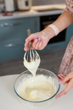 Hands Whipping Egg Whites With Manual Whisk In Bowl, Making Cream, Mousse Or Meringue For Dessert. Homemade Pastry, Delicious Sweets