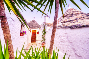 Famous Trulli Houses during a Sunny Day with Bright Blue Sky in Alberobello, Puglia
