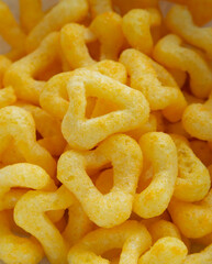snacks and chips on a white plate close-up