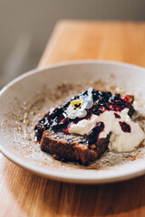 Sweet toast from homemade banana bread, non dairy yogurt and fresh berries compote