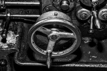  Metalworking workshop, metal processing machines.  Vintage Industrial Machinery in a old factory - black and white photo