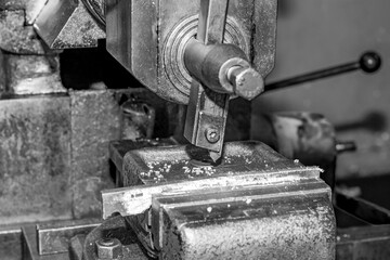  Metalworking workshop, metal processing machines.  Vintage Industrial Machinery in a old factory - black and white photo