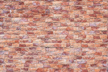 Colorful brick wall background of the building.