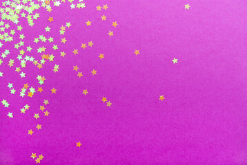 Golden stars glitter on violet background.