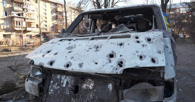 Russian missile destroyed automobile and damaged houses in Kyiv city on March 18, 2022. After bombing, war in Ukraine, terror and genocide of Ukrainian people