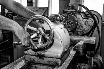 Metalworking workshop, metal processing machines.  Vintage Industrial Machinery in a old factory -...