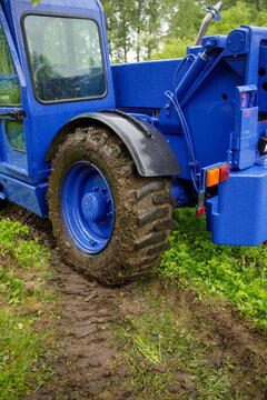 a wheel loader of the technical relief organization drives over the softened ground