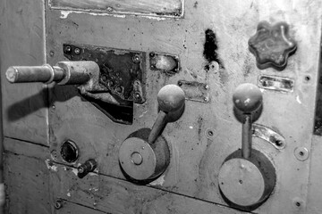  Metalworking workshop, metal processing machines.  Vintage Industrial Machinery in a old factory - black and white photo