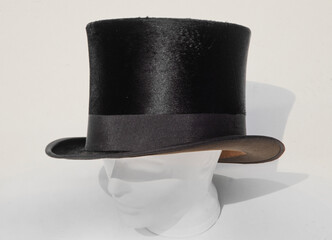 Cylinder hat. High black hat. Dandy style. Capotain.