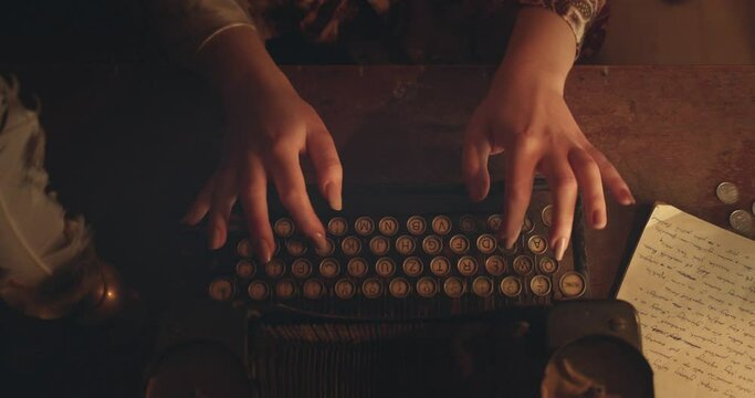 Top Shot of Feminine Armenian Hands Typing on an Old Typewriter
