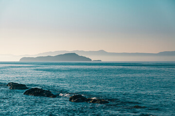 Naklejka premium Panoramic seascape. Rocky seashore of Aegean Sea, Crete, Greece.