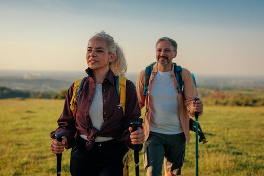 Middle Age Couple Spending Day In Nature And Hiking