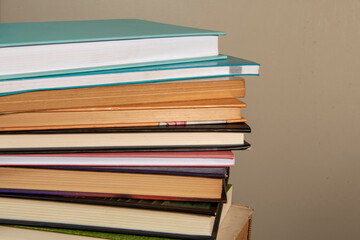 Close-up of background stack of old used books. Pile of vintage old books. Back to school