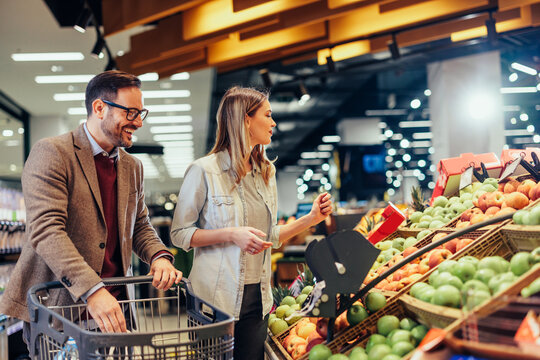 Couple Shop At Indoors Fruit Market