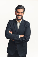 Vertical shot of young businessman in a black suit who is laughing looking at the camera, vertical shot isolated. High quality photo