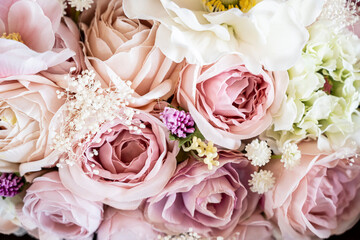 Close-up shot of a bouquet of pink roses
