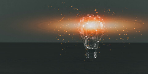 Lamp lightbulb glass watt orange color  electric energy power fluorescent glowing symbol decoration business strategy creative think idea bright vision technology motivation intelligence .3d render