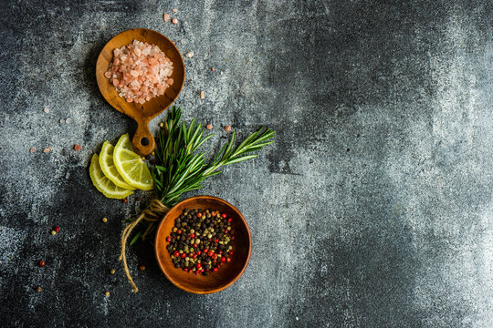 Cooking concept with spices on concrete background